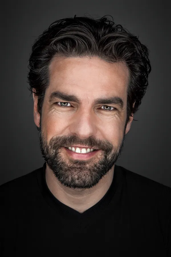 A man with thick, lustrous hair. Get exosomes for hair restoration from Don D. Fisher, D.O. at The BEST Program in Fort Lauderdale.