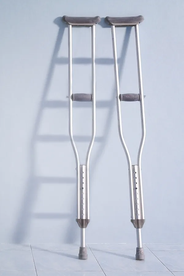 A pair of crutches. Get the Recovery peptide blend from Don D. Fisher, D.O. at The BEST Program in Fort Lauderdale.